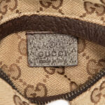 Gucci  GG Canvas Double Pocket Belt Bag - Image 7